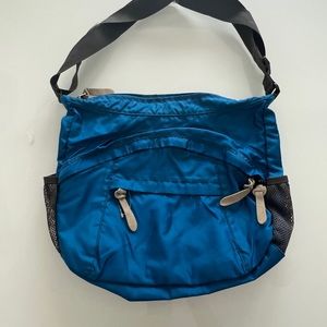 Brand New Never used Blue messenger style bag.